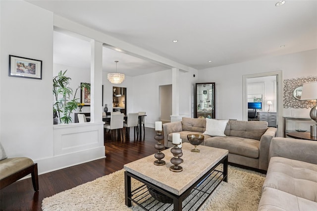 213 Phillips Pl, Orlando, FL 32806 - living area featuring wood finished floors and recessed lighting