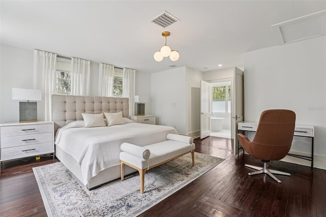 213 Phillips Pl, Orlando, FL 32806 - bedroom with dark wood-type flooring and ensuite bathroom
