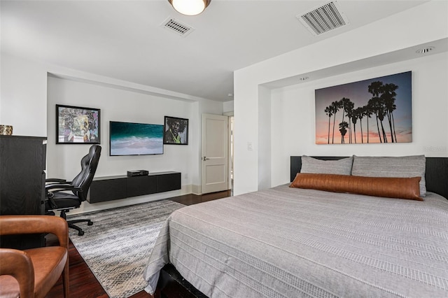 213 Phillips Pl, Orlando, FL 32806 - bedroom featuring wood finished floors and an office area