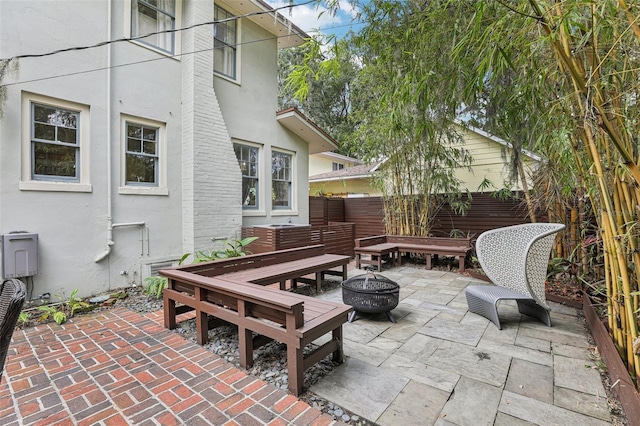 213 Phillips Pl, Orlando, FL 32806 - view of patio featuring a fire pit