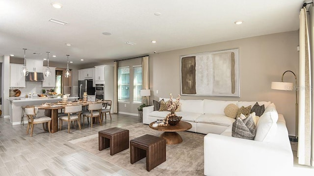 5277 Bowspirit Way, Saint Cloud, FL 34771 - living room with recessed lighting and light wood-style flooring