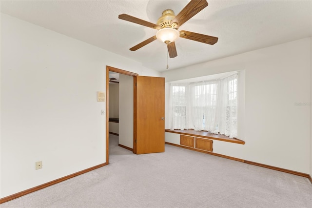 3310 Tall Timber Dr, Orlando, FL 32812 - unfurnished room with light carpet and a ceiling fan