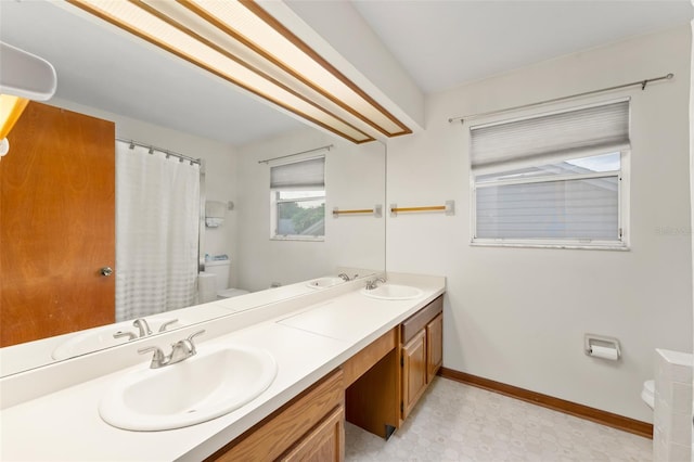 3310 Tall Timber Dr, Orlando, FL 32812 - bathroom with double vanity, curtained shower, and tile patterned floors