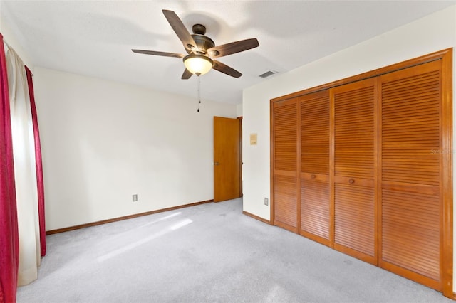 3310 Tall Timber Dr, Orlando, FL 32812 - unfurnished bedroom with carpet flooring, a closet, and ceiling fan