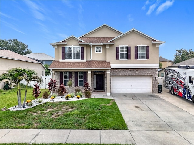 238 Hunt St, Clermont, FL 34711 - traditional-style house featuring stucco siding, a garage, driveway, and a porch