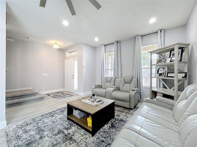 238 Hunt St, Clermont, FL 34711 - living room featuring a ceiling fan, wood finished floors, recessed lighting, and stairs