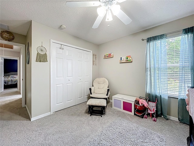 238 Hunt St, Clermont, FL 34711 - playroom featuring carpet, a textured ceiling, and ceiling fan