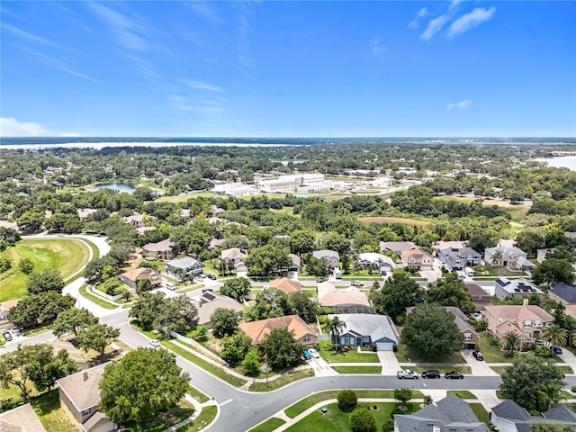 238 Hunt St, Clermont, FL 34711 - aerial perspective of suburban area featuring a large body of water