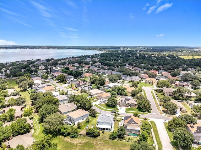 238 Hunt St, Clermont, FL 34711 - aerial perspective of suburban area featuring a nearby body of water