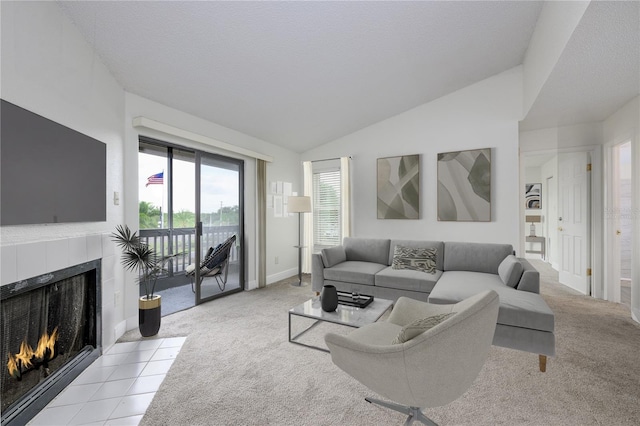 3700 Idlebrook Cir Unit 200, Casselberry, FL 32707 - living area featuring carpet floors, a fireplace, and vaulted ceiling