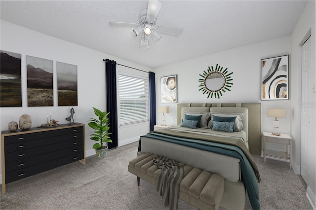 3700 Idlebrook Cir Unit 200, Casselberry, FL 32707 - carpeted bedroom with a textured ceiling and a ceiling fan