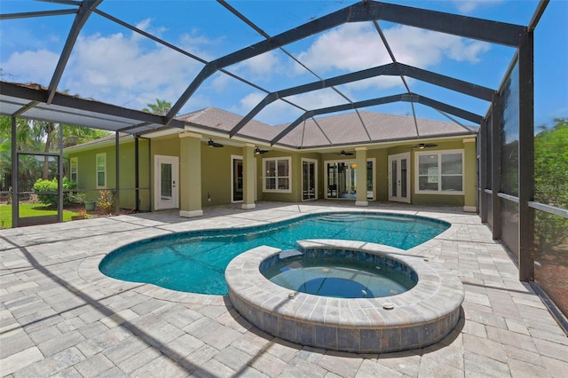 1818 W Cobblestone Ln, Saint Augustine, FL 32092 - view of swimming pool with a ceiling fan, a pool with connected hot tub, and a patio area