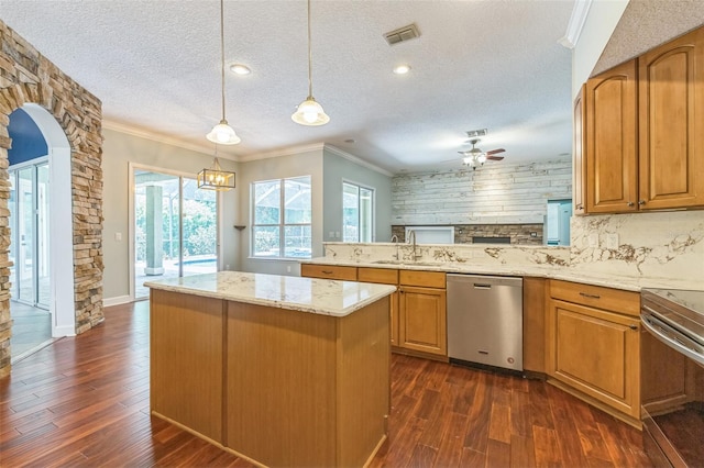 1818 W Cobblestone Ln, Saint Augustine, FL 32092 - kitchen featuring dishwasher, a ceiling fan, ornamental molding, stove, and dark wood-style floors