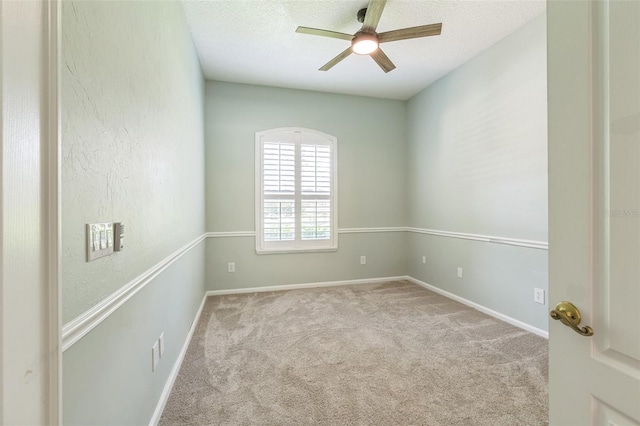 1818 W Cobblestone Ln, Saint Augustine, FL 32092 - empty room with ceiling fan, carpet, and a textured ceiling