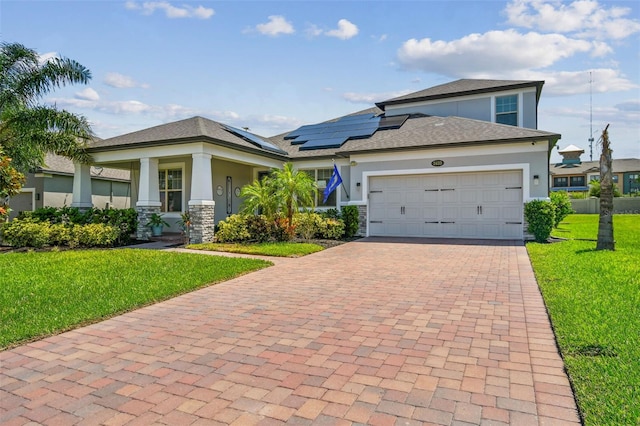 2433 Santa Vista Loop, Apopka, FL 32703 - view of front of home with stucco siding, decorative driveway, and a front yard