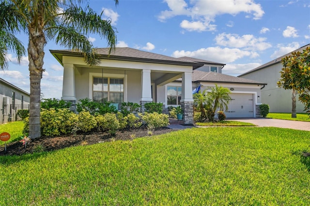 2433 Santa Vista Loop, Apopka, FL 32703 - view of front of home with driveway, a front yard, stucco siding, a garage, and stone siding
