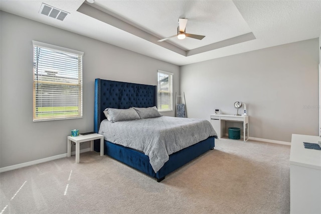 2433 Santa Vista Loop, Apopka, FL 32703 - bedroom with a raised ceiling, carpet flooring, and ceiling fan