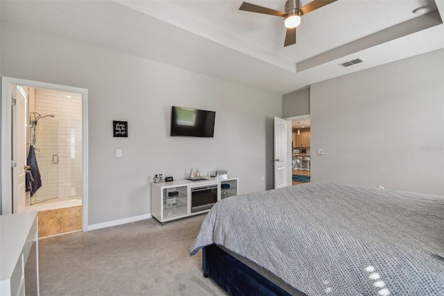 2433 Santa Vista Loop, Apopka, FL 32703 - bedroom featuring carpet floors, ceiling fan, and connected bathroom
