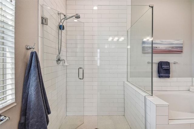 2433 Santa Vista Loop, Apopka, FL 32703 - bathroom featuring a stall shower and a bath
