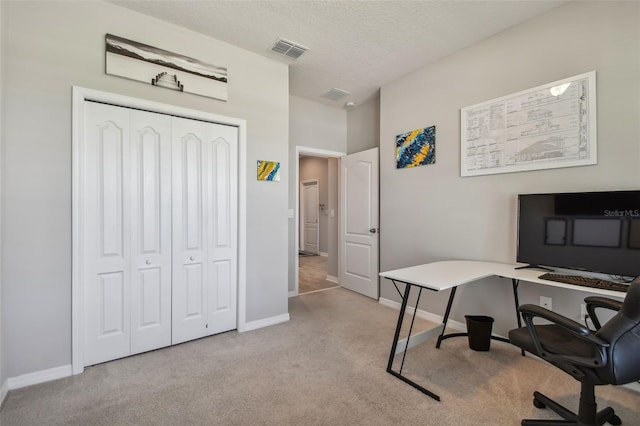 2433 Santa Vista Loop, Apopka, FL 32703 - carpeted home office featuring baseboards and a textured ceiling