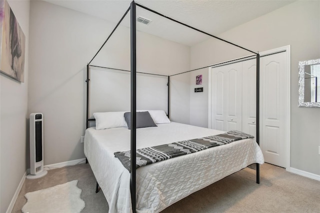 2433 Santa Vista Loop, Apopka, FL 32703 - bedroom with light carpet and a closet