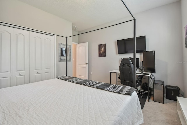 2433 Santa Vista Loop, Apopka, FL 32703 - bedroom featuring light colored carpet, a closet, and an office area