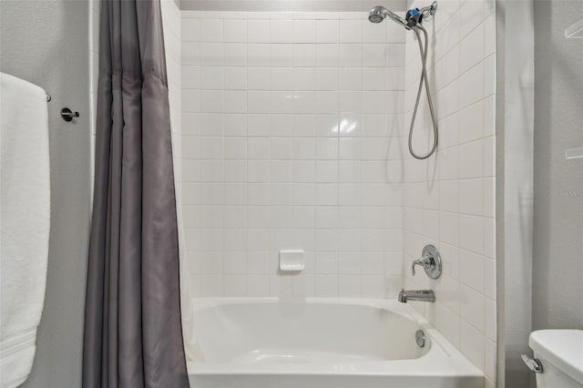 2433 Santa Vista Loop, Apopka, FL 32703 - full bathroom featuring toilet and shower / bath combination with curtain