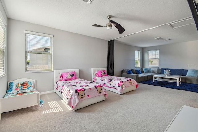 2433 Santa Vista Loop, Apopka, FL 32703 - carpeted bedroom with a textured ceiling and a ceiling fan
