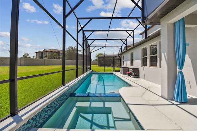 2433 Santa Vista Loop, Apopka, FL 32703 - view of pool featuring glass enclosure, a pool with connected hot tub, and a patio
