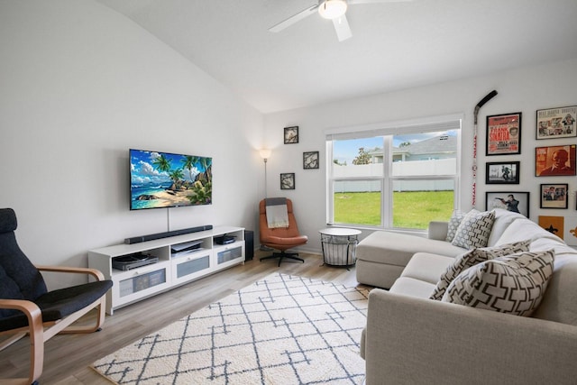 3324 Pink Oleander Ave, Mascotte, FL 34753 - living room with vaulted ceiling, wood finished floors, and ceiling fan