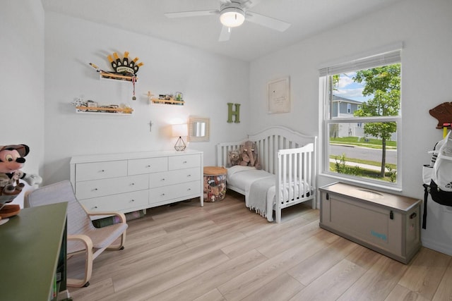 3324 Pink Oleander Ave, Mascotte, FL 34753 - bedroom featuring light wood-type flooring and a ceiling fan
