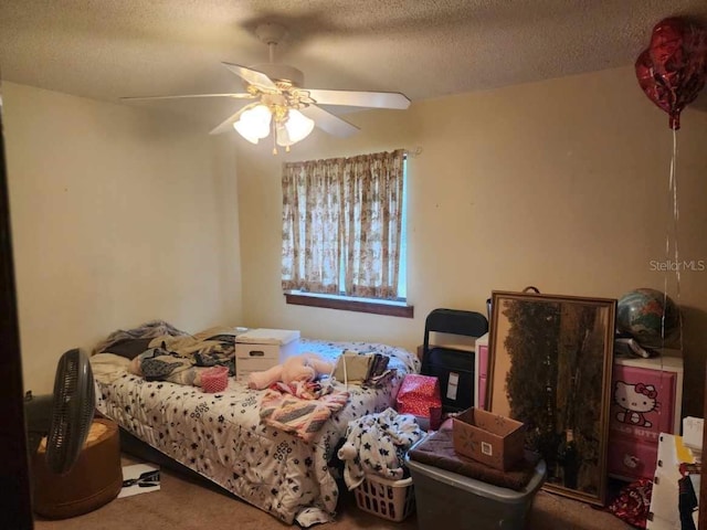 201 N Hart Rd, Geneva, FL 32732 - bedroom with carpet floors, a textured ceiling, and a ceiling fan