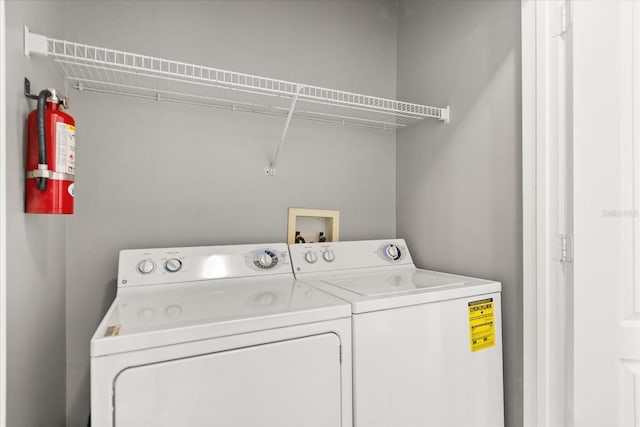 8842 Villa View Cir Unit 207, Orlando, FL 32821 - washroom with washer and clothes dryer