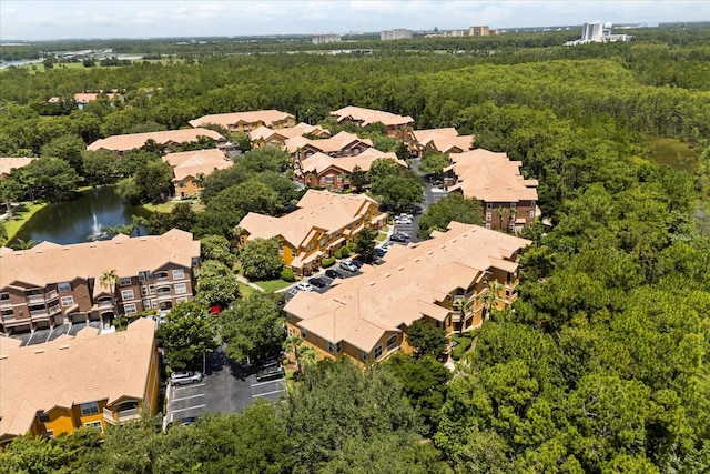 8842 Villa View Cir Unit 207, Orlando, FL 32821 - aerial view of property's location with a forest and nearby suburban area