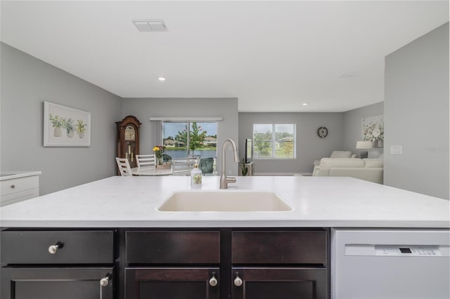 138 Old Mill Pond Rd, Edgewater, FL 32141 - kitchen featuring dishwasher, open floor plan, light countertops, a center island with sink, and recessed lighting