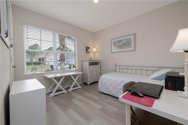 138 Old Mill Pond Rd, Edgewater, FL 32141 - bedroom featuring light wood-style flooring