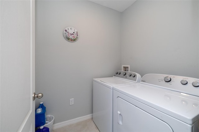138 Old Mill Pond Rd, Edgewater, FL 32141 - washroom featuring separate washer and dryer and light tile patterned floors