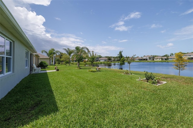 138 Old Mill Pond Rd, Edgewater, FL 32141 - view of green lawn featuring a water view