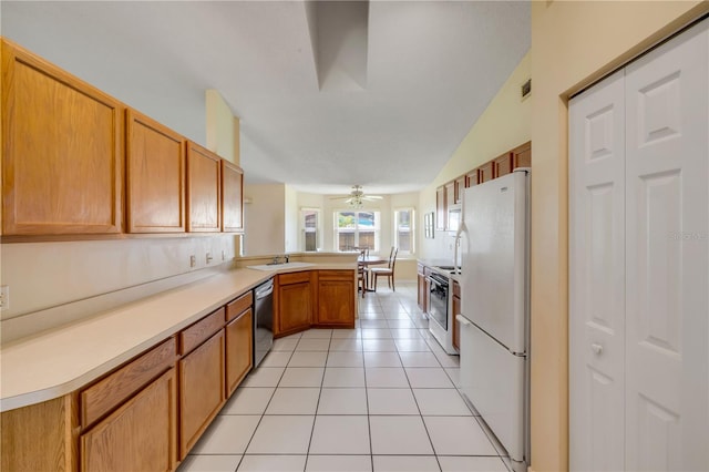 19 Potters Ln, Palm Coast, FL 32164 - kitchen featuring white appliances, a peninsula, light countertops, light tile patterned flooring, and a ceiling fan