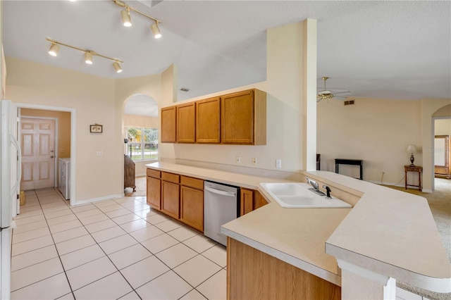19 Potters Ln, Palm Coast, FL 32164 - kitchen featuring dishwasher, arched walkways, a peninsula, a ceiling fan, and light countertops