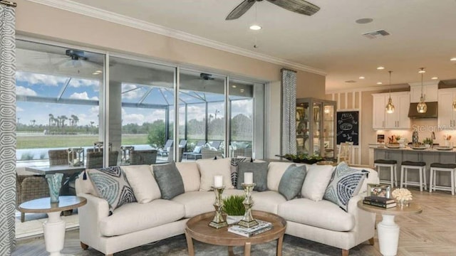 5295 Bowspirit Way, Saint Cloud, FL 34771 - living area featuring ceiling fan, ornamental molding, and recessed lighting
