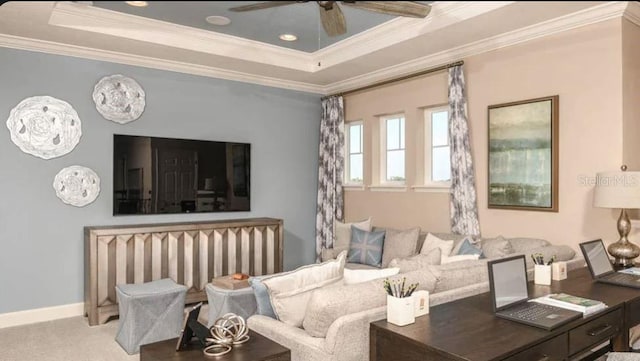 5295 Bowspirit Way, Saint Cloud, FL 34771 - living area featuring crown molding, a ceiling fan, a raised ceiling, and carpet floors