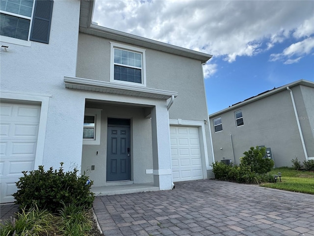 1314 Isleta Loop, Kissimmee, FL 34741 - view of exterior entry featuring stucco siding