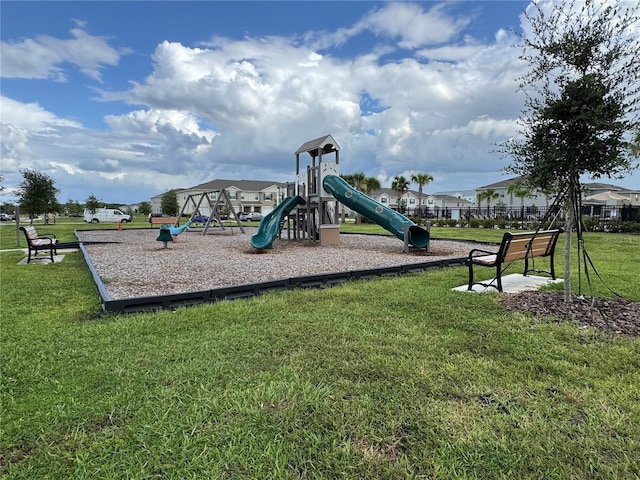 1314 Isleta Loop, Kissimmee, FL 34741 - communal playground featuring a lawn