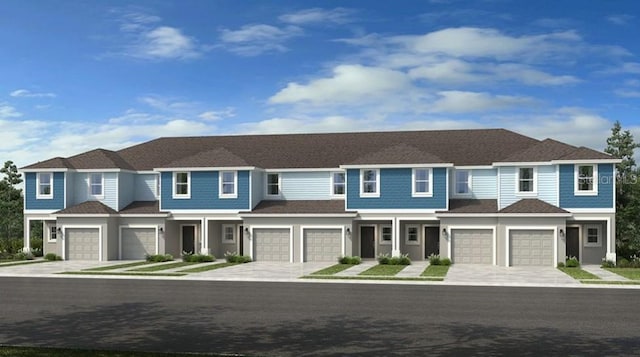 2580 Penguin Blvd, Davenport, FL 33837 - townhome / multi-family property with an attached garage and driveway