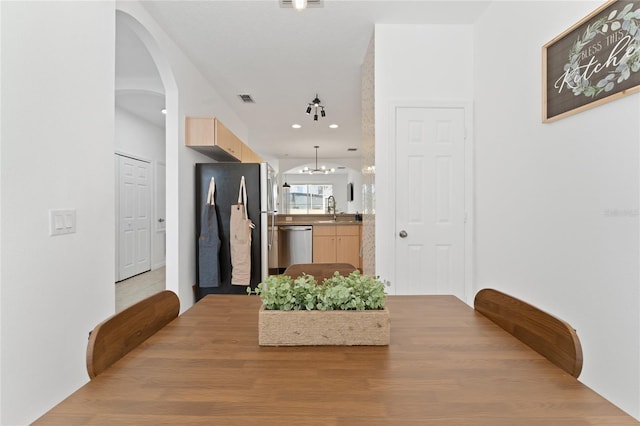 1176 S Beach Cir, Kissimmee, FL 34746 - dining area with arched walkways and recessed lighting