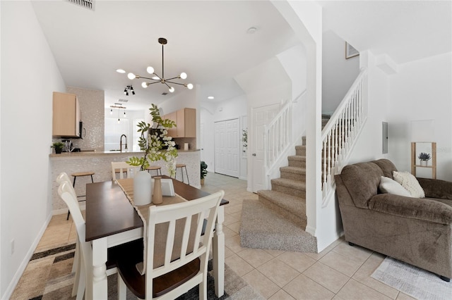 1176 S Beach Cir, Kissimmee, FL 34746 - dining room featuring stairs, a chandelier, light tile patterned floors, and recessed lighting
