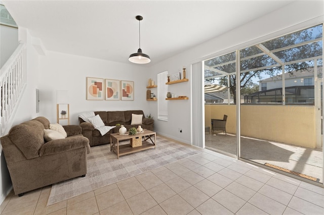 1176 S Beach Cir, Kissimmee, FL 34746 - living room with stairs and light tile patterned floors