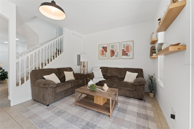 1176 S Beach Cir, Kissimmee, FL 34746 - tiled living room featuring stairway