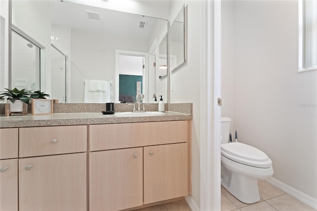 1176 S Beach Cir, Kissimmee, FL 34746 - bathroom with vanity, tile patterned floors, and a shower stall